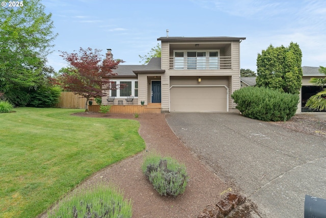 16190 SW Theresa Ct, Beaverton, OR 97007 - view of front of house with driveway, a garage, a chimney, and covered porch
