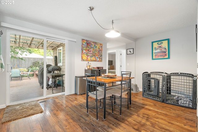 16190 SW Theresa Ct, Beaverton, OR 97007 - dining area with hardwood / wood-style floors and baseboards