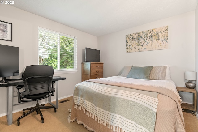 16190 SW Theresa Ct, Beaverton, OR 97007 - bedroom with light carpet, a desk, and baseboards