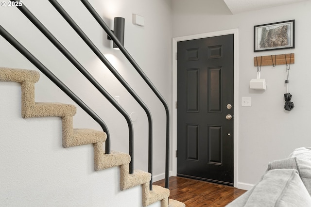 16190 SW Theresa Ct, Beaverton, OR 97007 - foyer entrance with stairway, dark wood finished floors, and baseboards