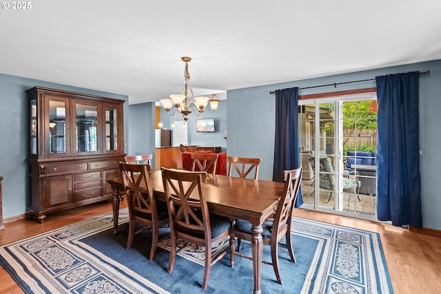 9440 SW Washington Dr, Portland, OR 97223 - dining room with a chandelier and wood finished floors