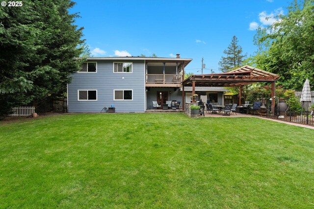 back of house featuring a patio and a pergola