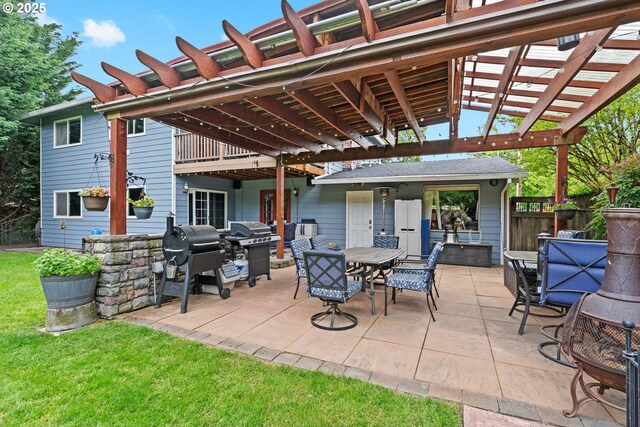 view of patio featuring area for grilling, outdoor dining area, fence, and a pergola