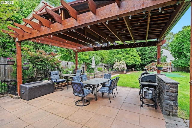 view of patio with outdoor dining area and a pergola