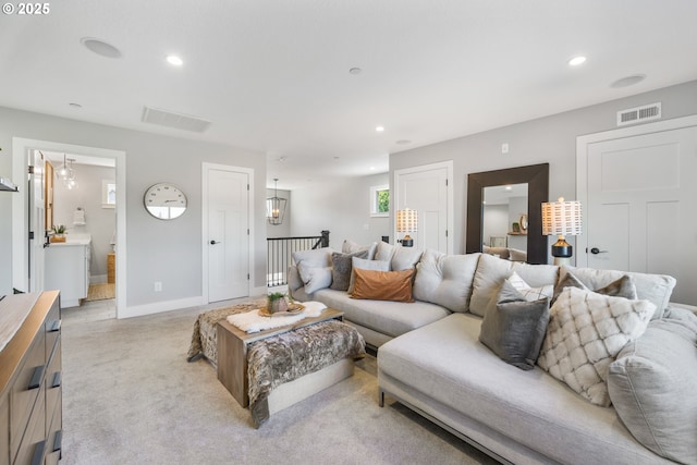 4148 S 11th Cir, Ridgefield, WA 98642 - living area featuring light colored carpet, recessed lighting, and a chandelier