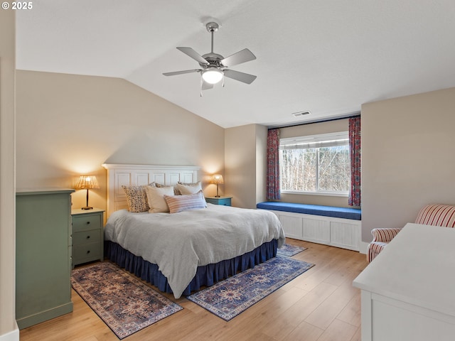 1617 NE 1st St, Battle Ground, WA 98604 - bedroom with lofted ceiling, light wood-style floors, radiator heating unit, and ceiling fan
