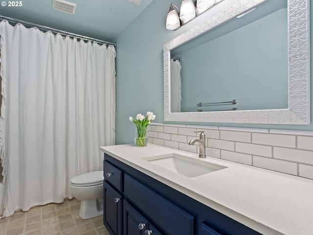 1617 NE 1st St, Battle Ground, WA 98604 - bathroom with toilet, backsplash, vanity, and curtained shower