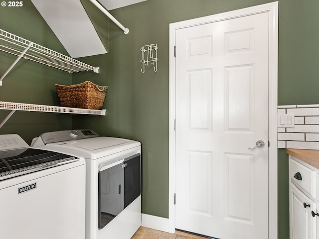 1617 NE 1st St, Battle Ground, WA 98604 - laundry area featuring washing machine and dryer, cabinet space, and baseboards
