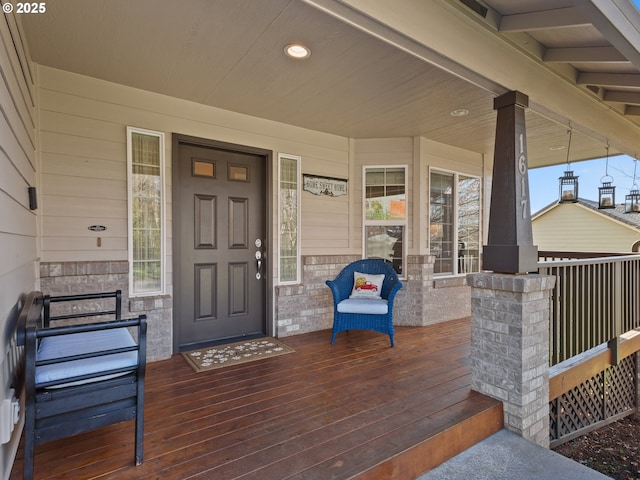 entrance to property with covered porch