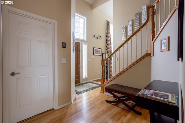 entrance foyer with light wood-type flooring