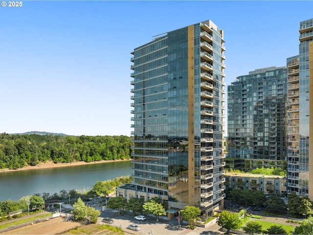 view of property with a water view