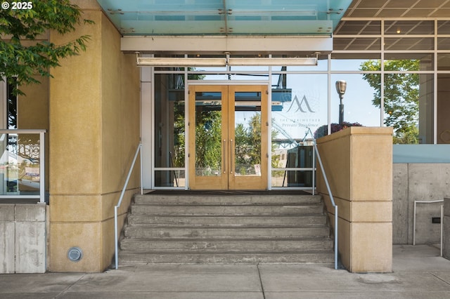 view of exterior entry featuring french doors