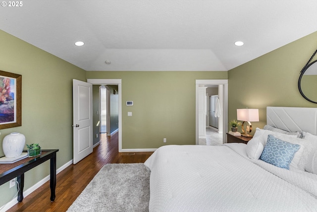 bedroom featuring vaulted ceiling, recessed lighting, dark wood finished floors, and baseboards