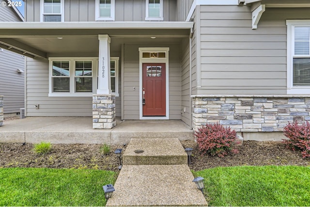 31028 NW Turel Dr, North Plains, OR 97133 - entrance to property with stone siding, board and batten siding, and a porch