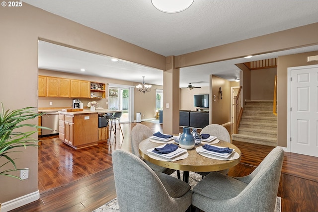 dining space featuring baseboards, dark wood-style floors, stairway, recessed lighting, and ceiling fan with notable chandelier