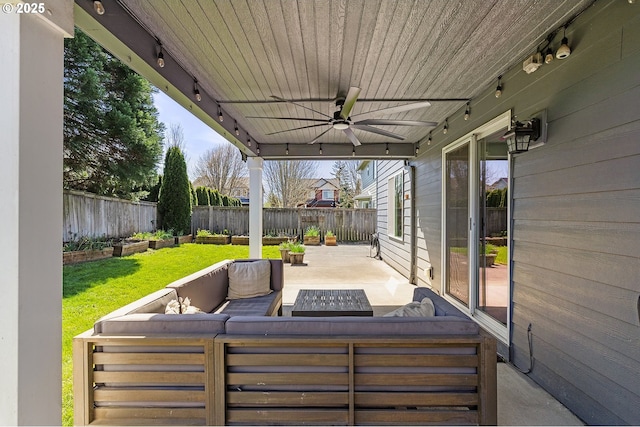 view of patio / terrace with a fenced backyard, ceiling fan, and an outdoor hangout area