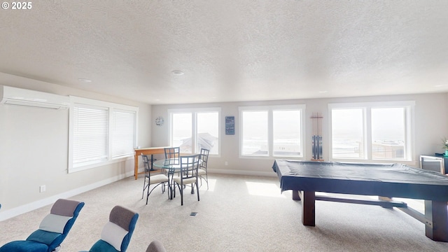 6604 NE Logan Rd, Lincoln City, OR 97367 - recreation room with an AC wall unit, a textured ceiling, and light carpet