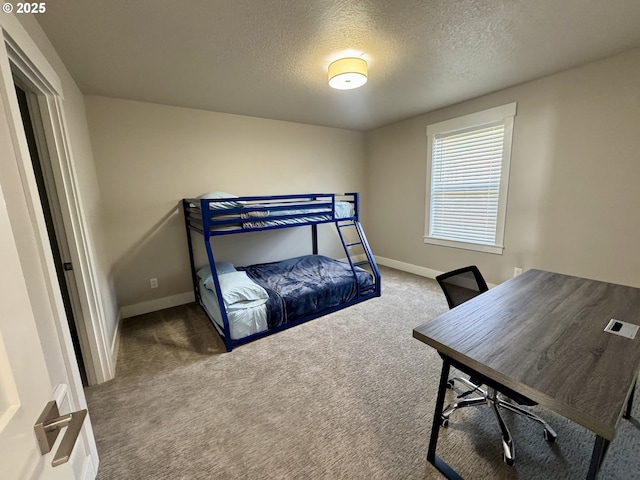 6604 NE Logan Rd, Lincoln City, OR 97367 - carpeted bedroom with a textured ceiling and an office area