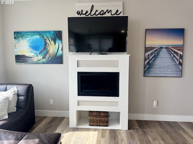 6604 NE Logan Rd, Lincoln City, OR 97367 - living area featuring wood finished floors and baseboards