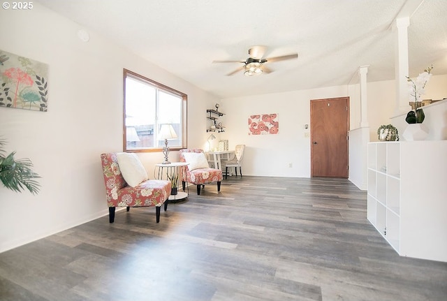 sitting room featuring ceiling fan, a textured ceiling, and wood finished floors