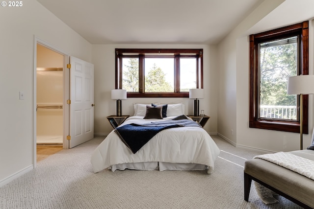 27161 Briggs Hill Rd, Eugene, OR 97405 - bedroom featuring light colored carpet, multiple windows, baseboards, a spacious closet, and vaulted ceiling