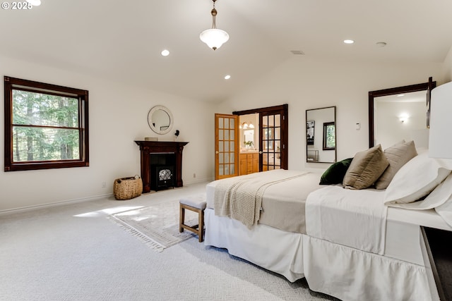 27161 Briggs Hill Rd, Eugene, OR 97405 - bedroom featuring vaulted ceiling, french doors, recessed lighting, carpet flooring, and a fireplace with flush hearth