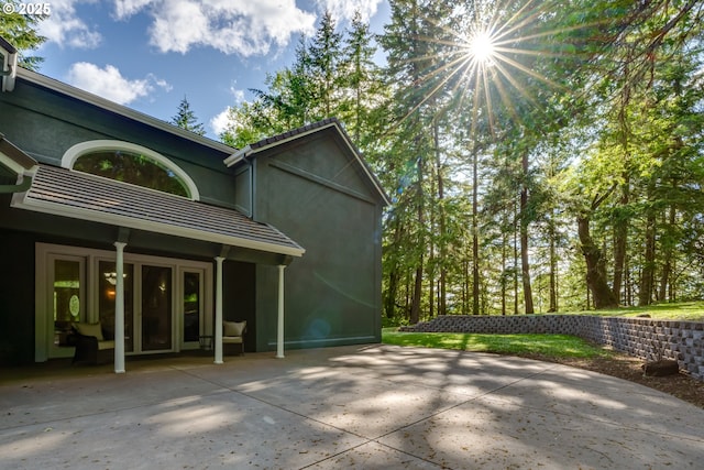 27161 Briggs Hill Rd, Eugene, OR 97405 - rear view of house with a patio area and stucco siding