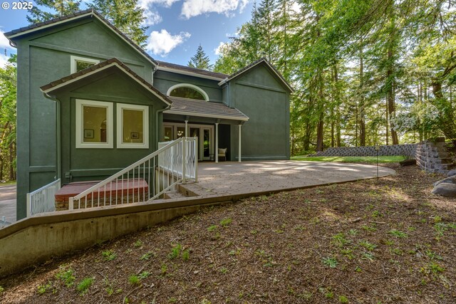 27161 Briggs Hill Rd, Eugene, OR 97405 - rear view of property with a patio area and stucco siding