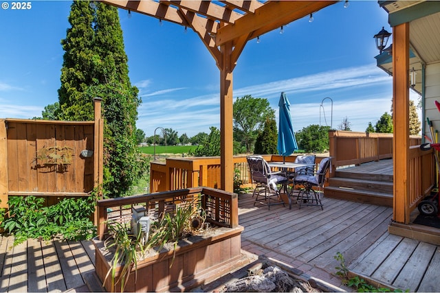 78613 Powerline Rd, Hermiston, OR 97838 - wooden deck with a pergola and outdoor dining area