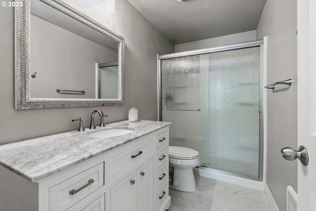 1100 N Meridian St Unit 46, Newberg, OR 97132 - bathroom featuring vanity, marble finish floors, and a shower stall
