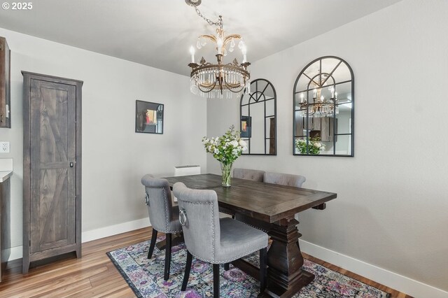 1100 N Meridian St Unit 46, Newberg, OR 97132 - dining space featuring a chandelier and light wood-style floors