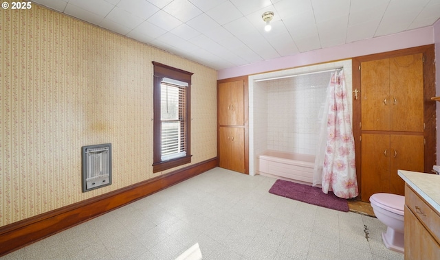 full bathroom with toilet, vanity, shower / bathtub combination with curtain, and heating unit