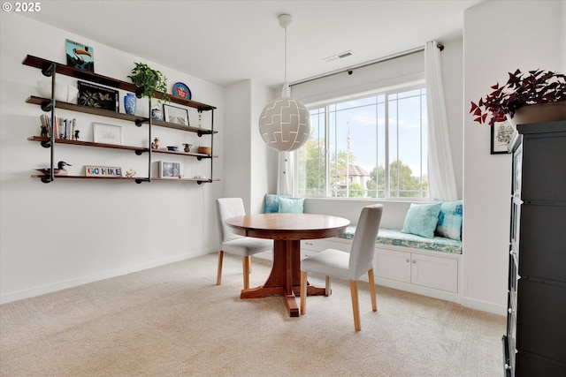 28671 SW Orleans Ave, Wilsonville, OR 97070 - dining space featuring light carpet, baseboards, and breakfast area