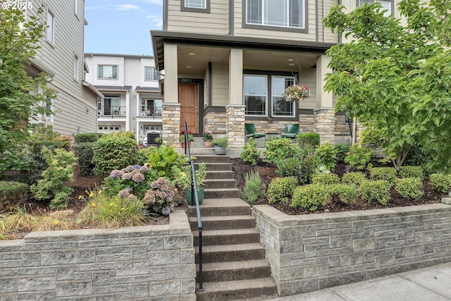 28671 SW Orleans Ave, Wilsonville, OR 97070 - entrance to property featuring stone siding and covered porch