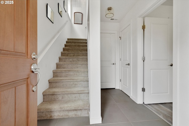 28671 SW Orleans Ave, Wilsonville, OR 97070 - stairway featuring tile patterned floors