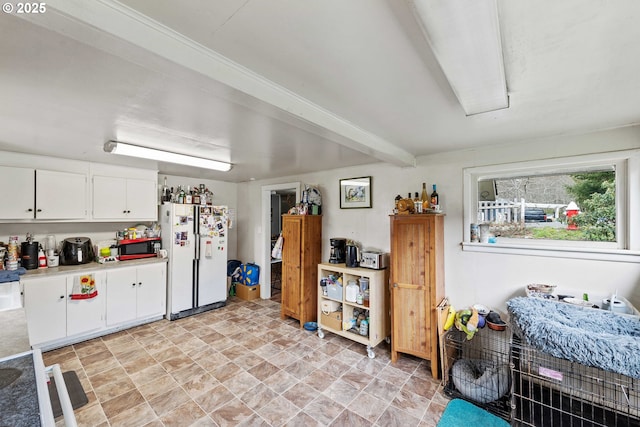 interior space with freestanding refrigerator