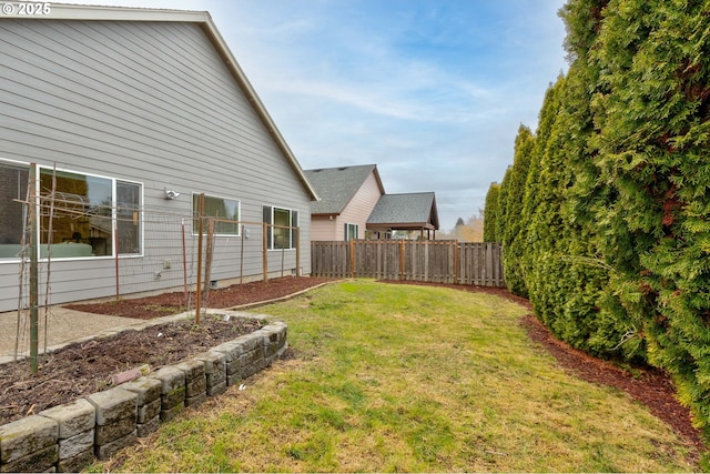 view of yard featuring a fenced backyard