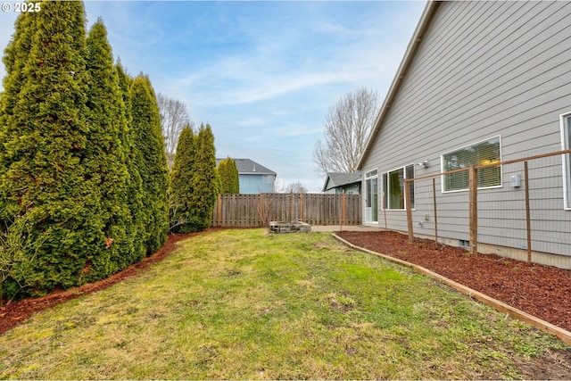 view of yard featuring fence