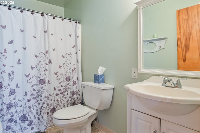 bathroom with vanity, a shower with curtain, and toilet