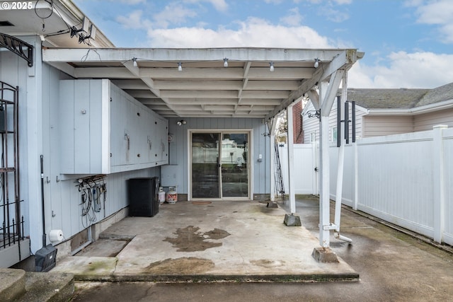 view of patio featuring a carport