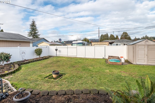 view of yard with a storage shed