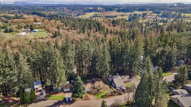 drone / aerial view with a forest view