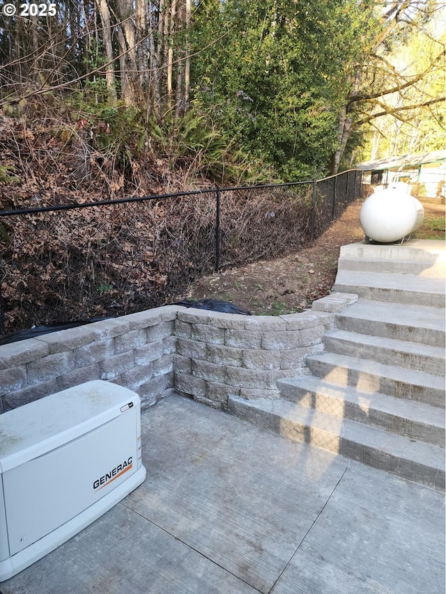 view of patio / terrace with fence