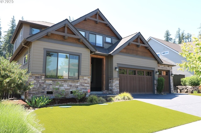 5786 NW Hood Loop, Camas, WA 98607 - craftsman-style home featuring concrete driveway, stone siding, and a garage