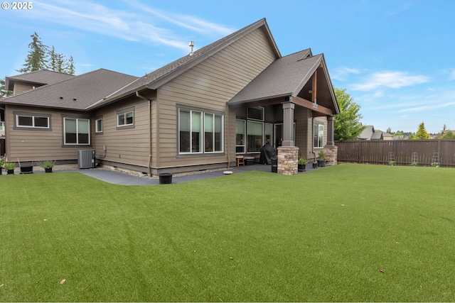 5786 NW Hood Loop, Camas, WA 98607 - back of house with central AC unit, a patio area, and a shingled roof
