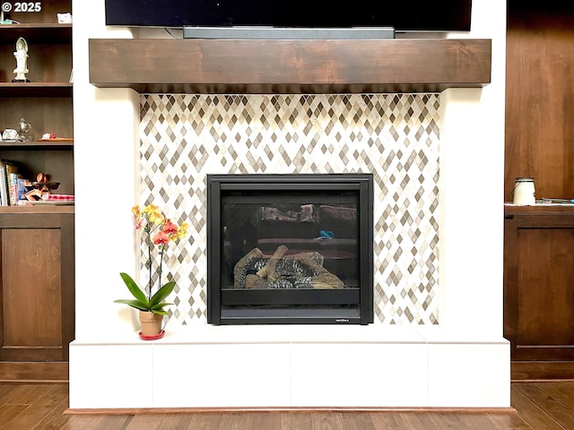 5786 NW Hood Loop, Camas, WA 98607 - detailed view of wood finished floors and a tile fireplace