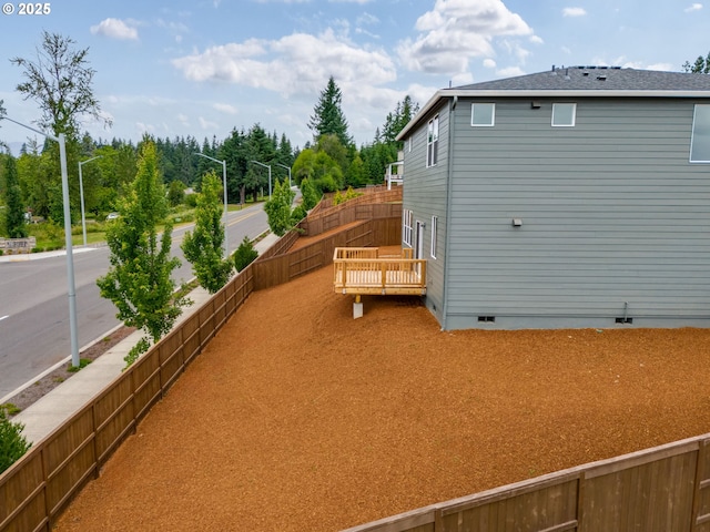 1512 W 14th Ave, La Center, WA 98629 - view of property exterior with crawl space and a fenced backyard