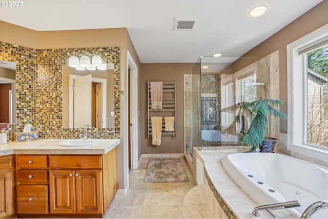 full bath with vanity, visible vents, a whirlpool tub, a shower stall, and backsplash