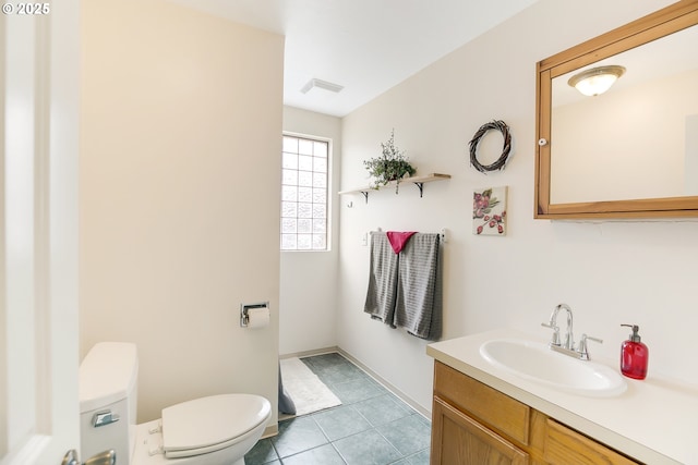 6308 SE 93rd Ave, Portland, OR 97266 - bathroom featuring visible vents, tile patterned flooring, vanity, baseboards, and toilet