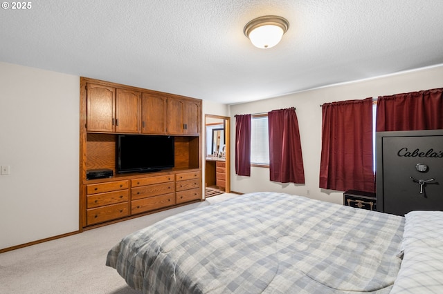 bedroom with light carpet, a textured ceiling, and baseboards